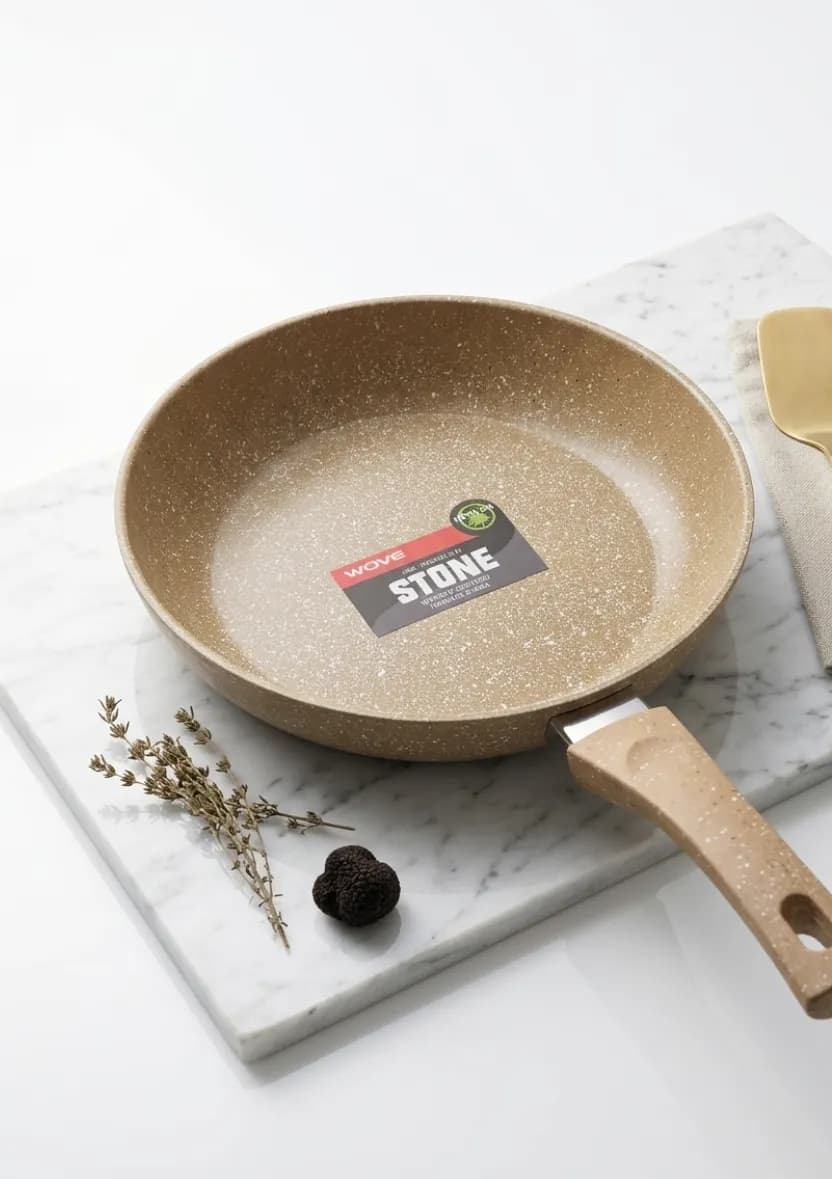 Le produit Poêle antiadhésive effet pierre WOVE STONE – Cuisson saine sans coller – Poêle résistante et facile à nettoyer