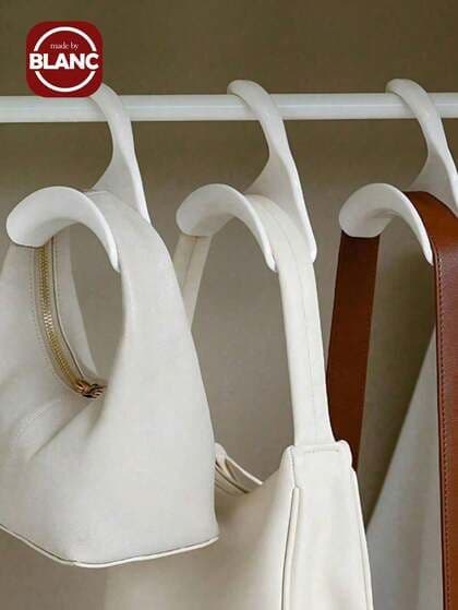 Le produit ceintre pour sac à main